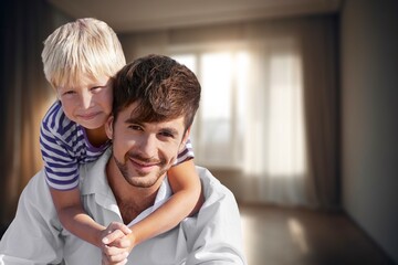 Dad and son have fun together at home