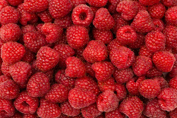 Tasty fresh raspberry as a background.