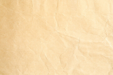 Crumpled yellow background paper texture