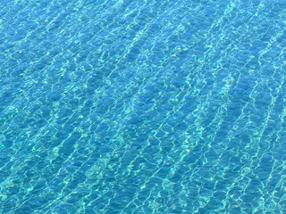 Blue water clear ripples surface aqua background 