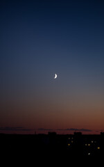 Night city under the moon, calm and tranquility
