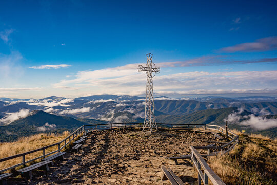 Tarnica Peak in Bieszczady on a Crisp Autumn Morning with Cross and Clear Blue Sky