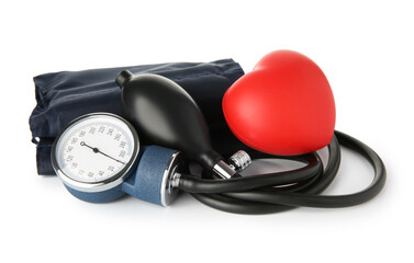 Blood pressure measuring device and red decorative heart isolated on white