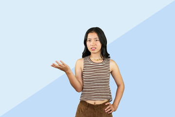 Excited Asian Student Girl gives expression hand fa gesture of sad, wow, happy, laughing in blue...