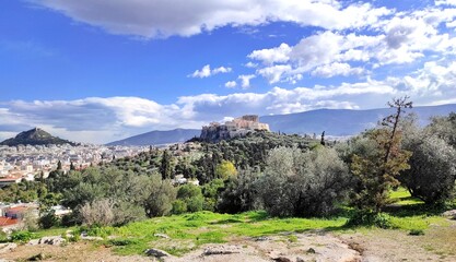 Fototapeta premium Photo of Mount Lycabettus (left) and the Parthenon on Acropolis Hill (right), as seen from Pnyx Hill in Athens, Greece. 