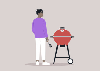 A culinary enthusiast stands confidently with a spatula in hand, ready to grill delicious food on a bright red barbecue grill, enjoying a beautiful day outdoors