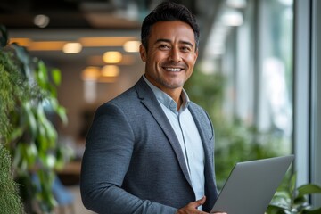 Businessman smiling at the camera while holding a laptop, Generative AI