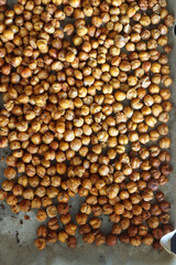 Sheet pan with homemade roasted chickpeas. Top view.