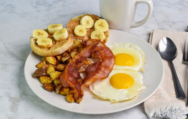 fried eggs with bacon and home fries