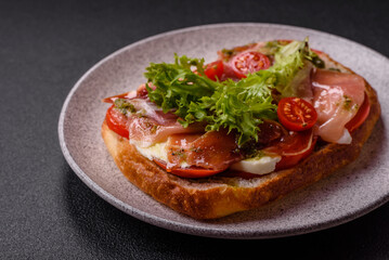 Ciabata with jamon or prosciutto, tomatoes, cheese and lettuce