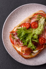 Ciabata with jamon or prosciutto, tomatoes, cheese and lettuce