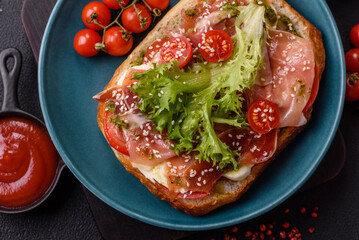 Ciabata with jamon or prosciutto, tomatoes, cheese and lettuce