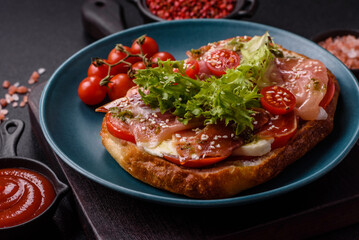 Ciabata with jamon or prosciutto, tomatoes, cheese and lettuce