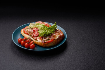 Ciabata with jamon or prosciutto, tomatoes, cheese and lettuce