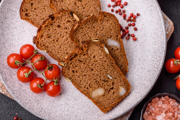 Brown bread with seeds, grains, salt and spices