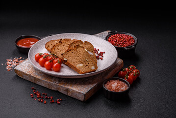 Brown bread with seeds, grains, salt and spices