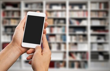 Hand hold a phone with blank screen