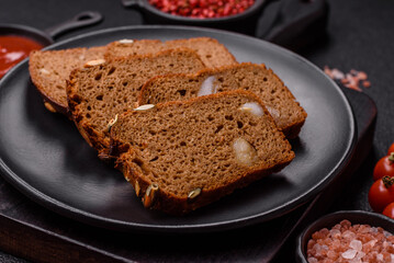 Brown bread with seeds, grains, salt and spices