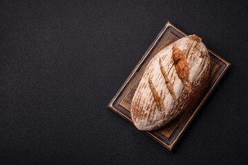 Brown bread with seeds, grains, salt and spices