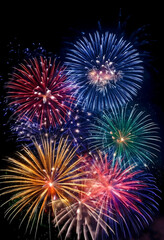 Obraz premium Colored fireworks against night sky