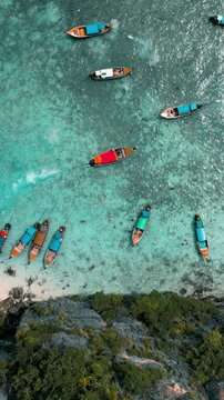 Aerial Capture of Coastal Waters with Boats in Motion
