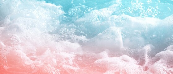 Fototapeta premium A tight shot of a wave in the ocean, blue sky seen in the distance, pink hue prevalent nearer
