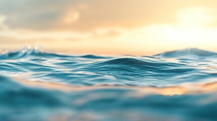 Fototapeta premium Calm ocean waves under a sunset sky.