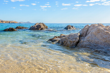 Different stages of the fantastic ocean waves. Rocky and sandy beach. Santa Maria Beach, Cabo San Lucas, Mexico.
