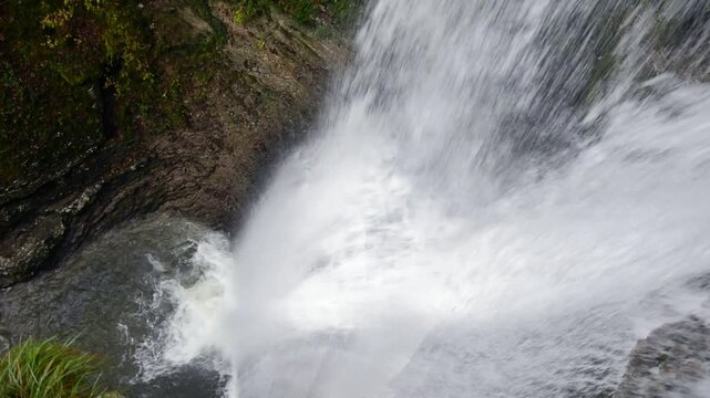 the sound of water in a mountain waterfall after the heavy autumn rains