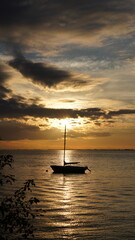 Breathtaking Golden Skies Over Tranquil Pier