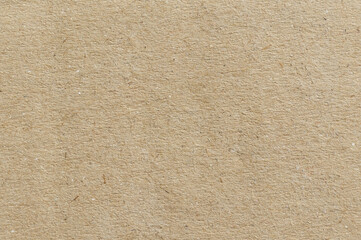 Recycled paper background showcasing a textured, eco-friendly surface ideal for art and design...