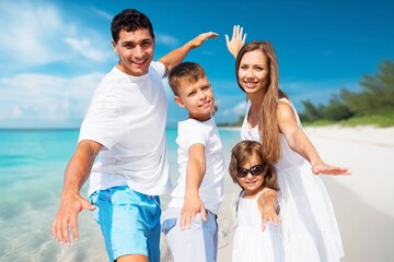 Happy family, Parents, children at vacation near sea