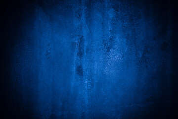 Old wall pattern texture cement blue dark abstract  blue color design are light with black gradient background.