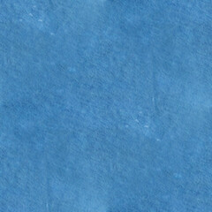 A vibrant blue backdrop with abstract stains enhancing visual appeal. Seamless background.