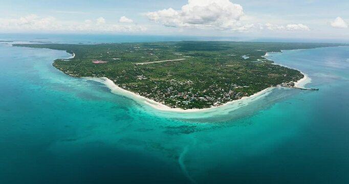 Aerial view of beautiful sandy beach on a tropical island. Kota Beach. Bantayan island, Philippines.