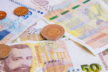 close-up: 50 bulgarian lev banknotes 20 bulgarian levs 2 bulgarian lev coin 50 stotinki coin © Hoover Studio