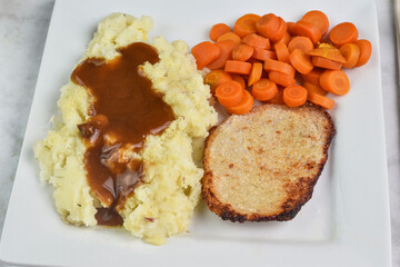 boneless pork chop  with mash potatoes  carrots