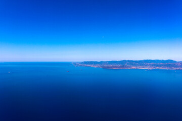 Breathtaking view of the sea and land from the plane in Sardinia