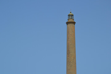 The Maspalomas Lighthouse (spanish: Faro de Maspalomas) located next to Maspalomas beach and sand dunes. Gran Canaria, Spain