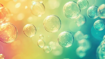Fototapeta premium Group of colorful bubbles floating atop liquid with various hues of blue, green, yellow, and pink