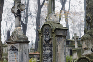 Fototapeta premium Old blank cemetery tombstones on a fall day.