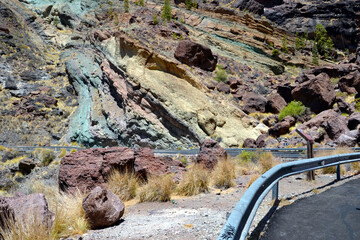 Los Azulejos de Veneguera. Rainbow colored rocks in the Mountains of Gran Canaria Island, Spain.