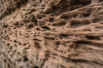 Detail of a weathered sandstone wall.