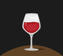 Elegant red wine glass on dark background