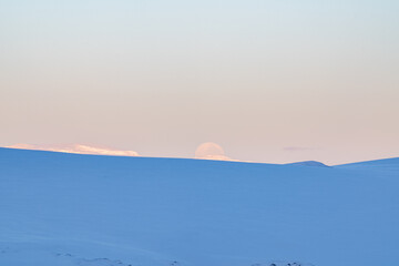Full yellow moon in Antarctica. Night