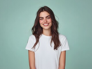 A young, cheerful, woman posing for a t-shirt mockup, wearing a blank , clean white shirt, blank pastel background