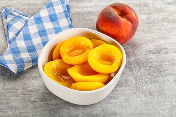 Ripe sweet and juicy canned peach