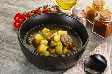 Soup with meatball and potato