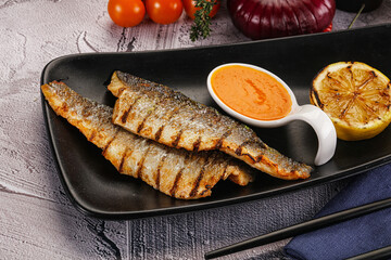Grilled seabass fillet with lemon