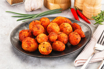 Baked young potato with paprika